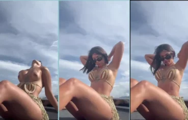 Gostosa no meio da praia exibindo seu delicioso peito