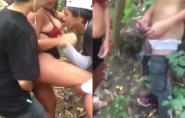 Morena cavalona gemendo alto enquanto é comida por dois no mato